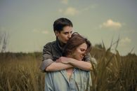 Woman with Short Hair Embracing Her Sister Tenderly by Neck