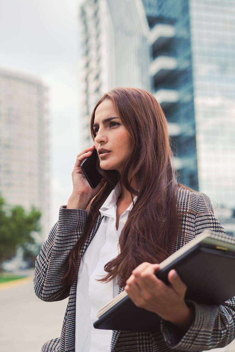 Portrait Of Businesswoman Talking On Phone