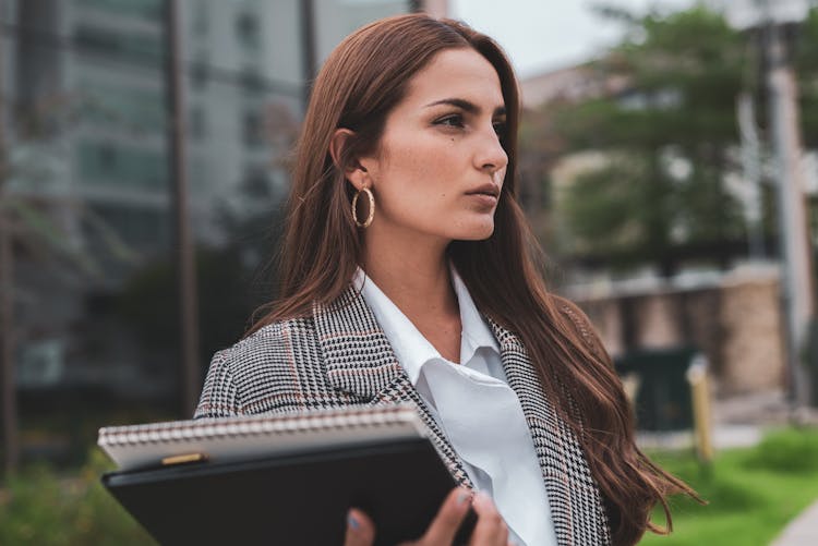 Confident Businesswoman Standing Outside Building