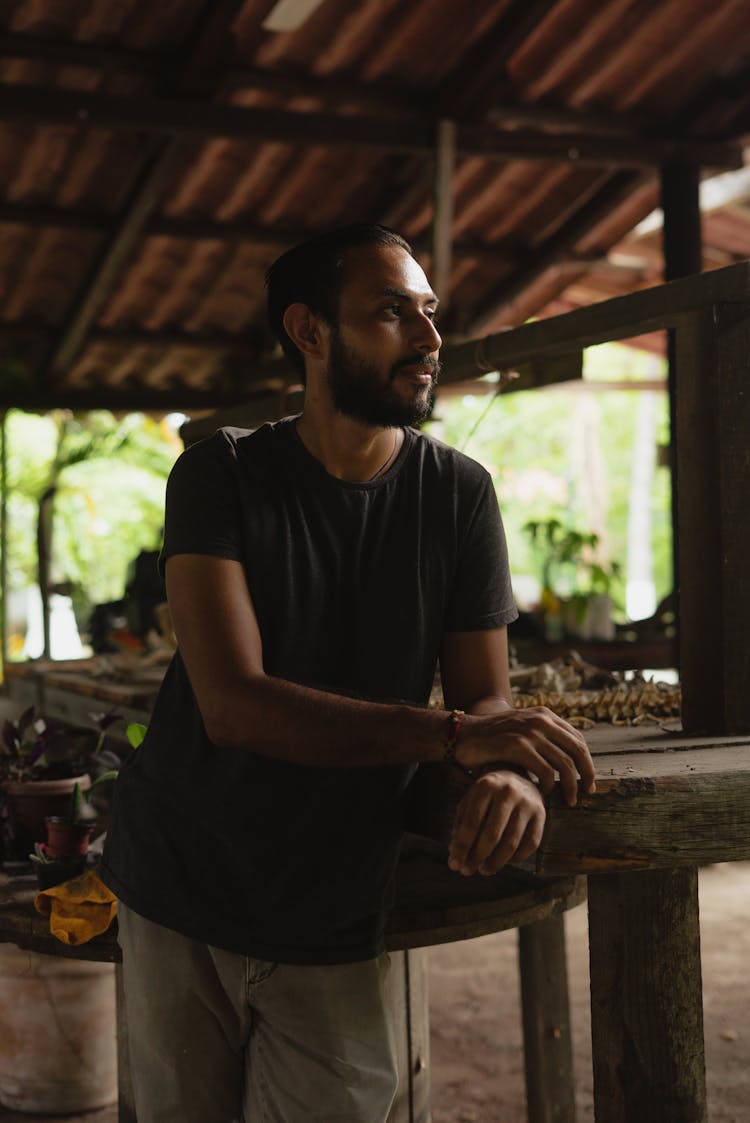 Man Leaning On Table