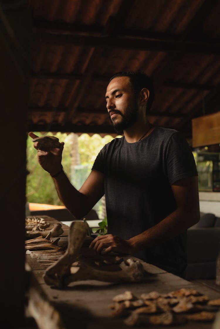 Paleontologist Holding Bone