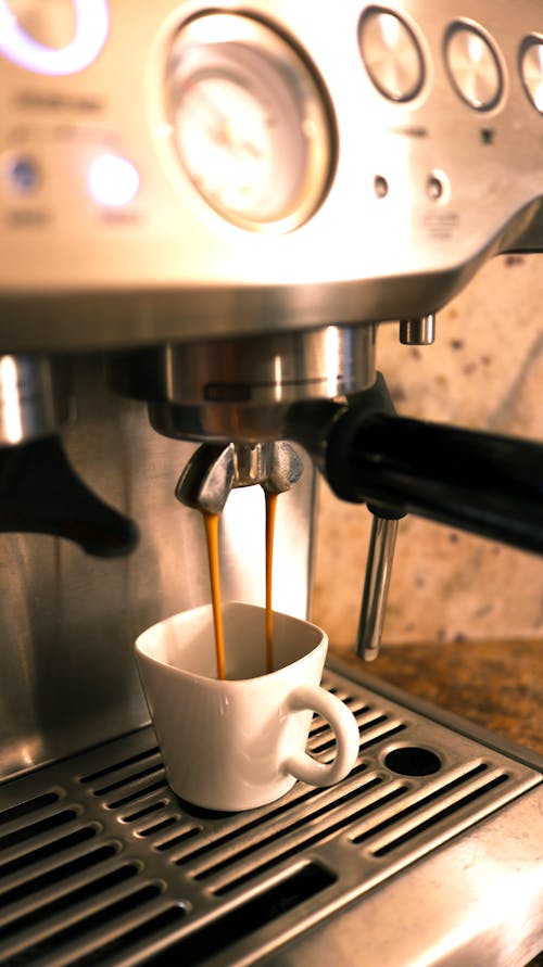 White Cup on Coffee Machine