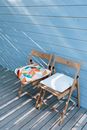 Two Empty Chairs on Deck