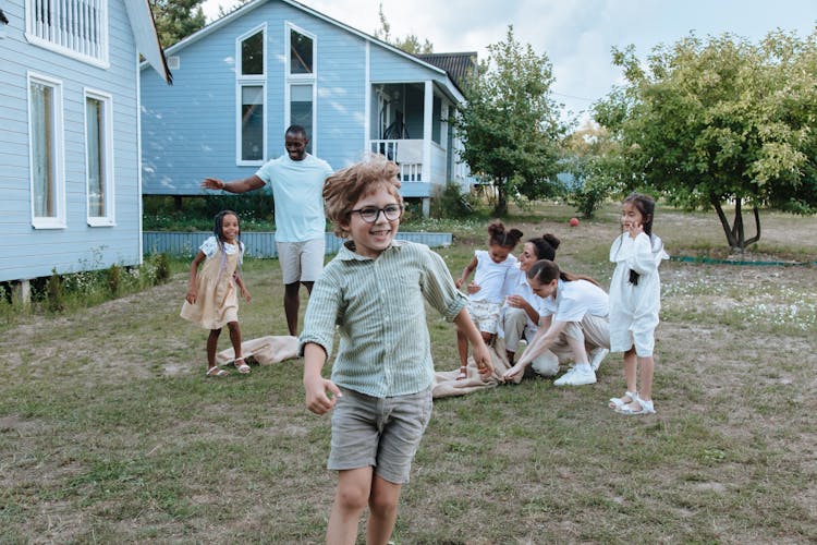 Kids Playing In The Backyard