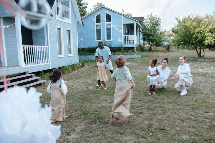 Kids Playing In The Backyard