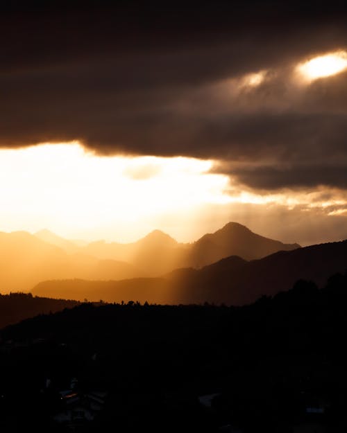 Free Silhouette of Mountains during Sunset Stock Photo