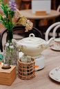 A White Teapot on the Table