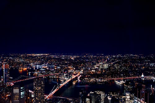 Бесплатное стоковое фото с Аэрофотосъемка, город, ночью, вечером