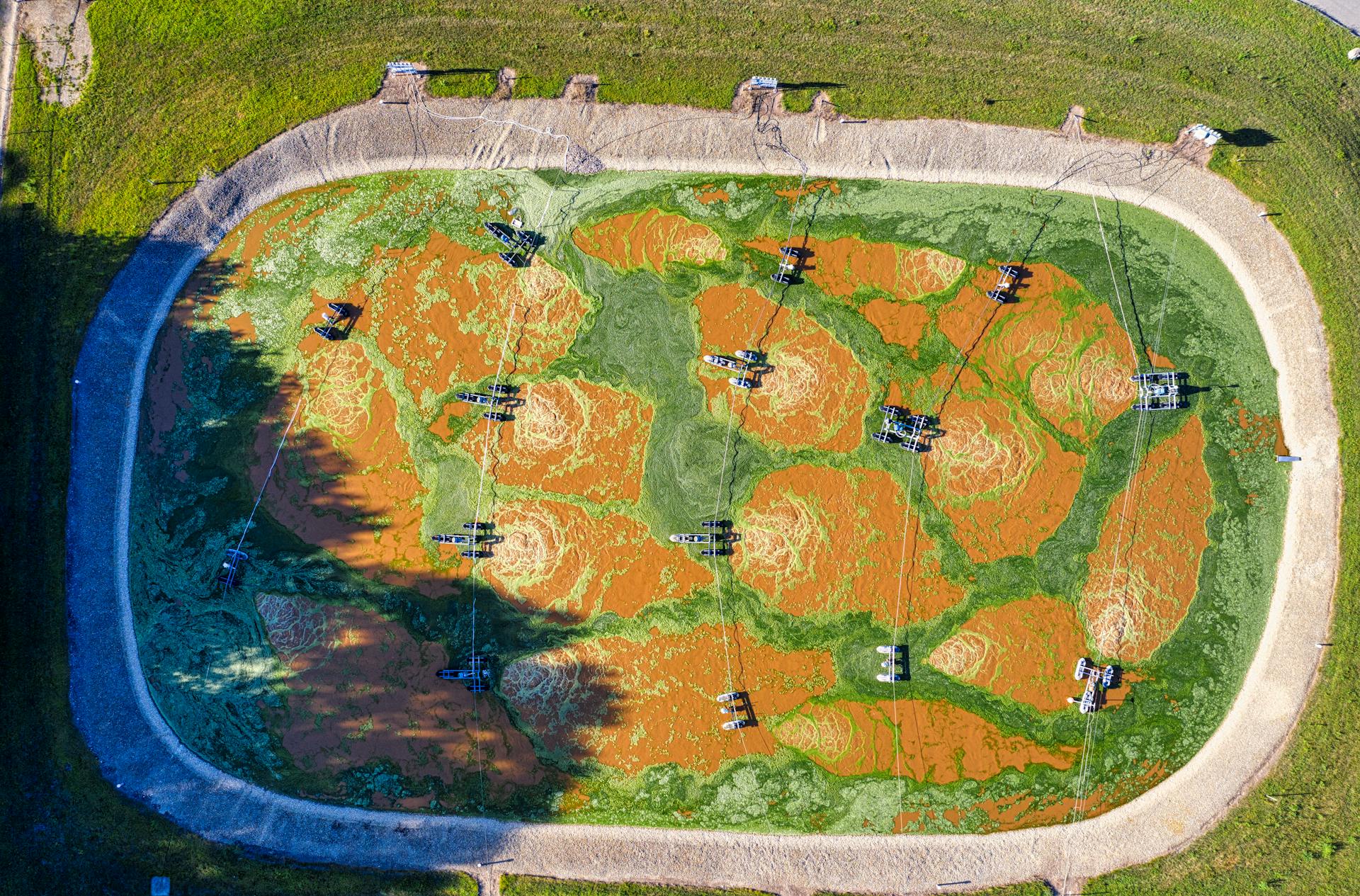 Top View of Machinery Floating on a Contaminated Pool