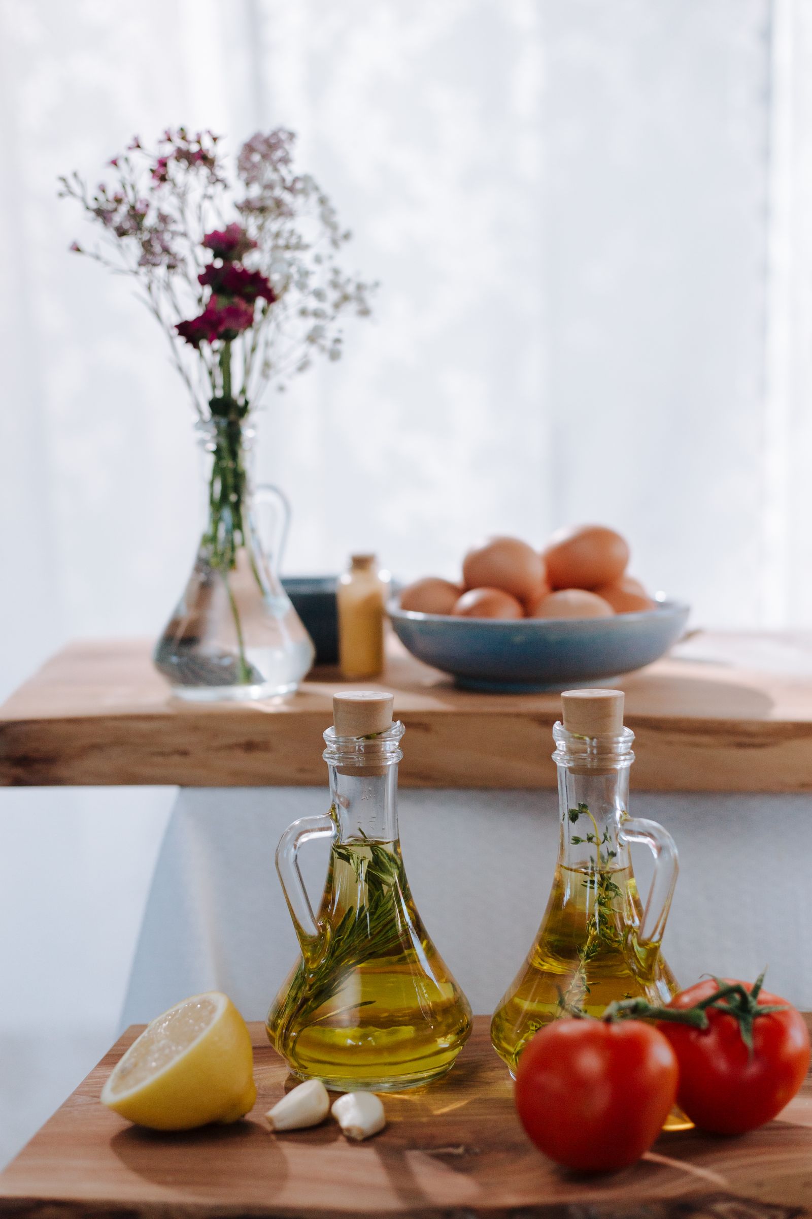 Ingredients for homemade pasta arranged on a kitchen surface.