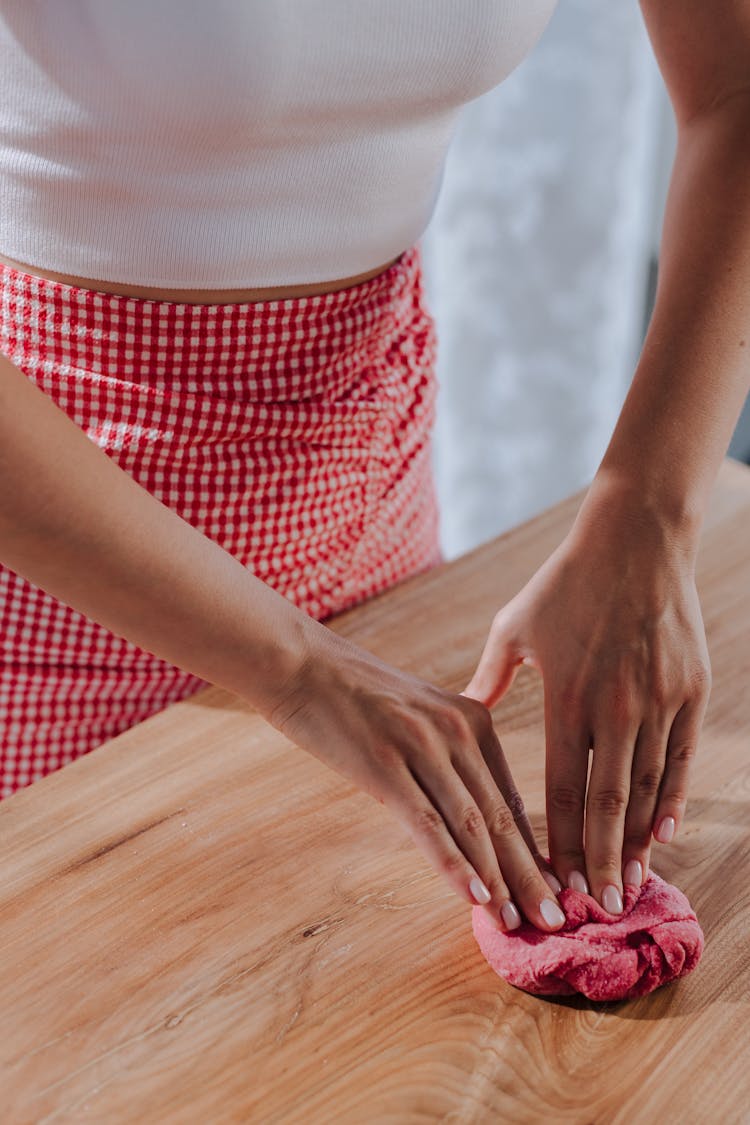 Unrecognizable Female Hands Making Colored Pasta Dough