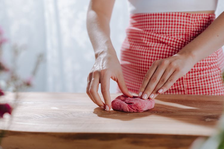  Unrecognizable Female Hands Kneading Red Coloured Dough For Pasta