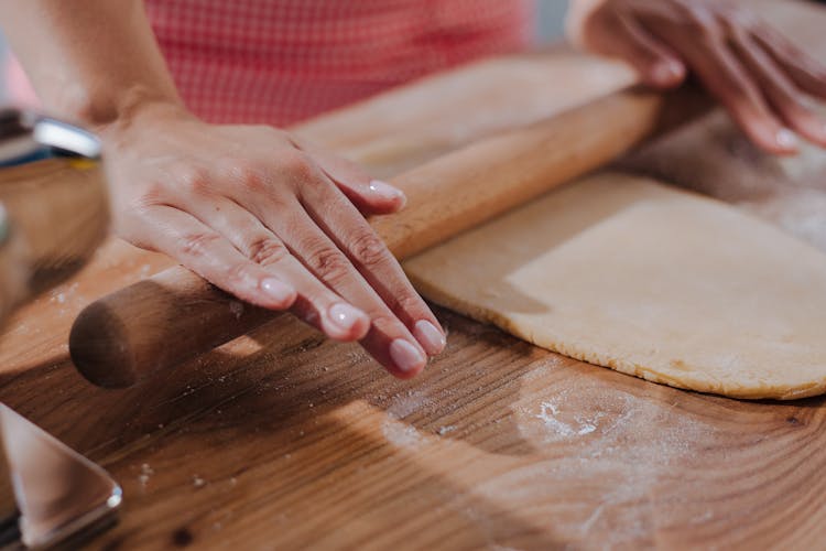 Hands Rolling Pasta Dough