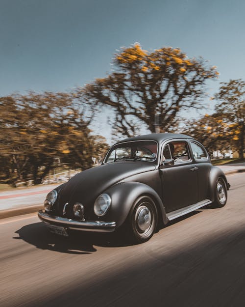 Black Volkswagen Beetle on Road