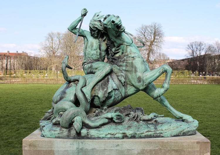 Woman Sitting On Horse Concrete Statue