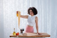 Woman in Room with Pasta Maker