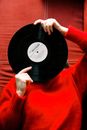 Woman in Red Clothes with Big Disk
