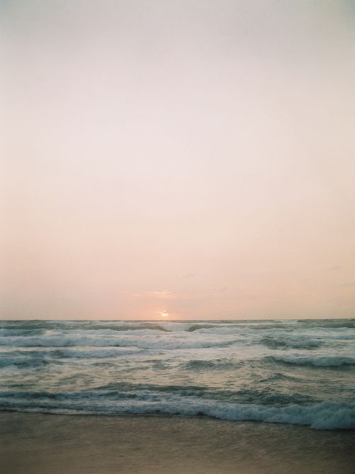 Free Peaceful sunset view over the Mediterranean Sea from the shore in Tel Aviv, Israel. Stock Photo