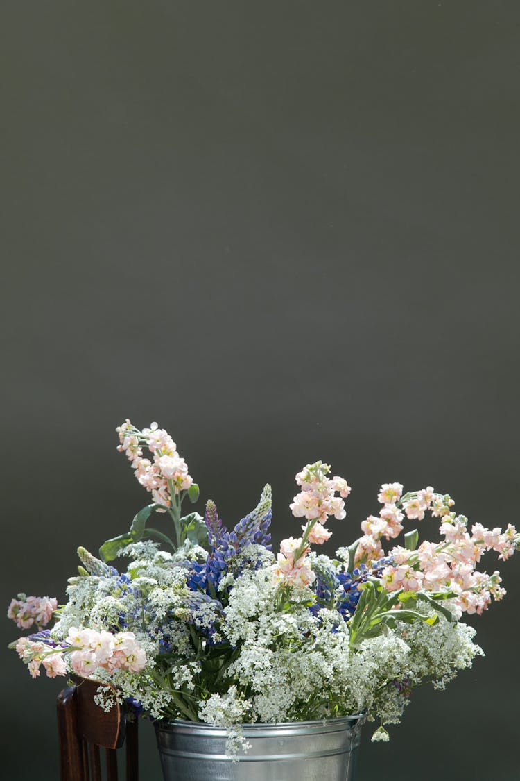 Flowers In A Tin Bucket