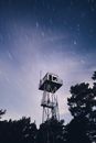White and Black Tower Under Blue Sky
