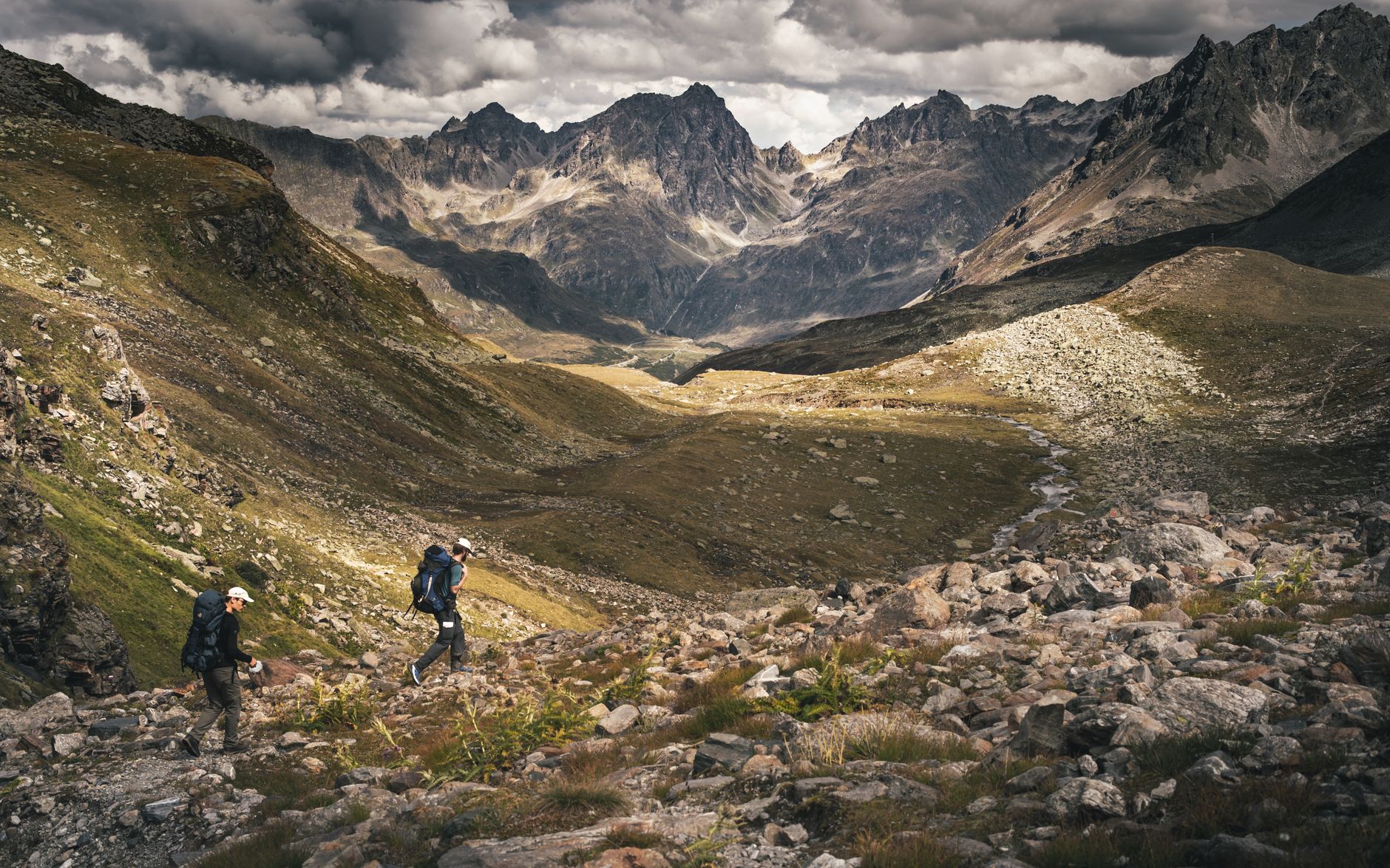 hiker alpine mountain trail