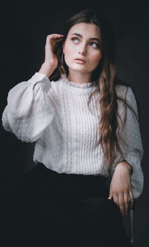 Portrait of Woman Wearing White Blouse