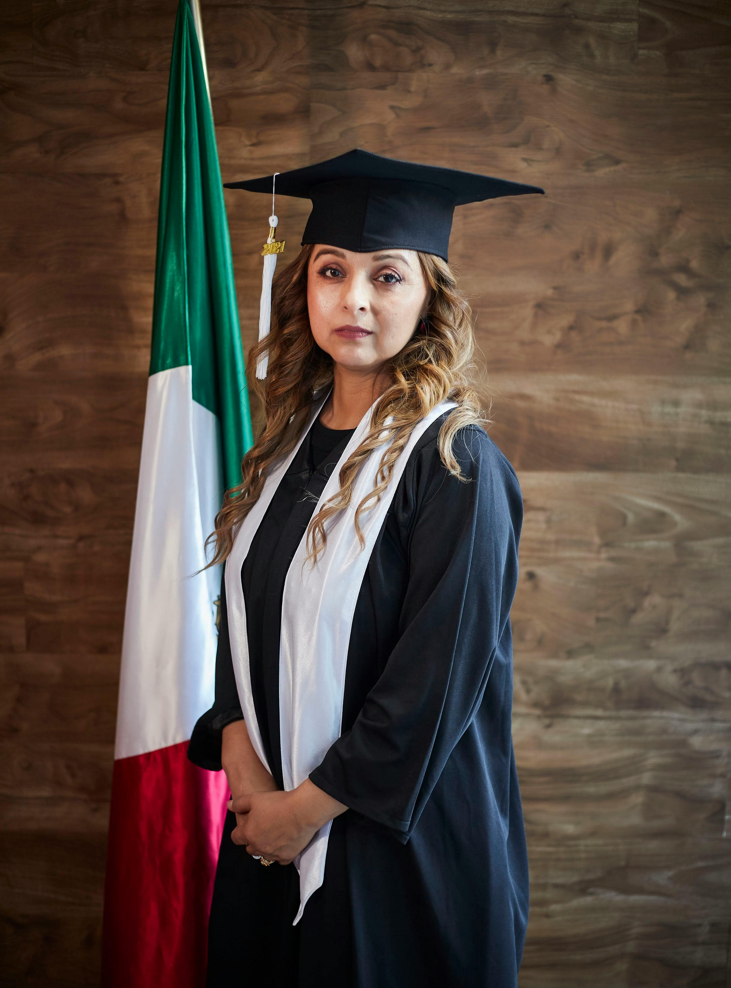 A woman in a graduation cap and gown photo – Free Gown Image on Unsplash