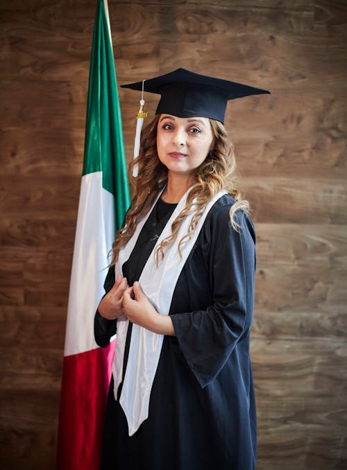 Photo of a Woman Wearing a Black Mortarboard