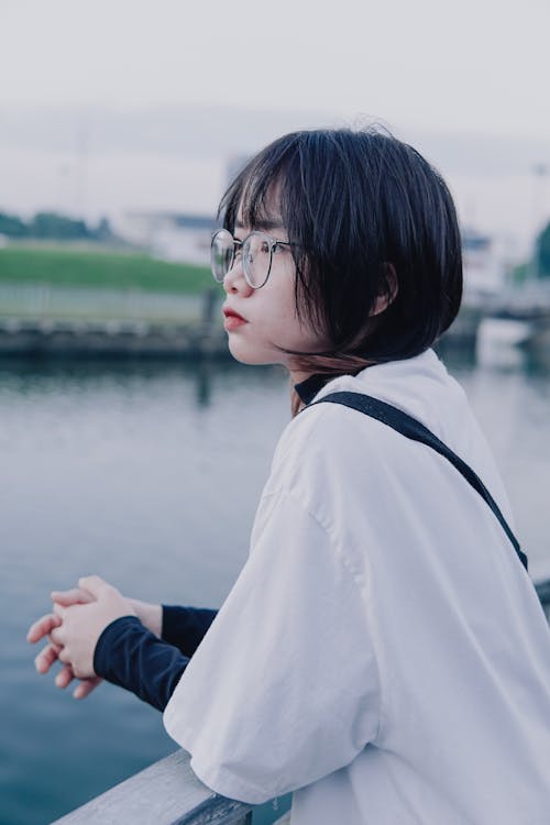 Portrait of a Girl with Short Hair Wearing Eyeglasses