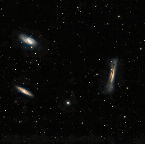 Free Capture of three distinct galaxies amidst countless stars in the vast cosmos. Stock Photo