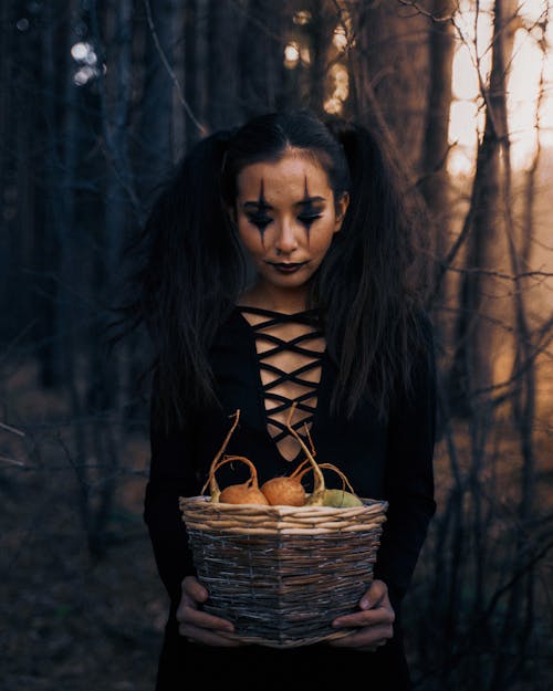 Woman Holding a Basket 