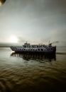 White and Black Ship on Sea Under White Clouds