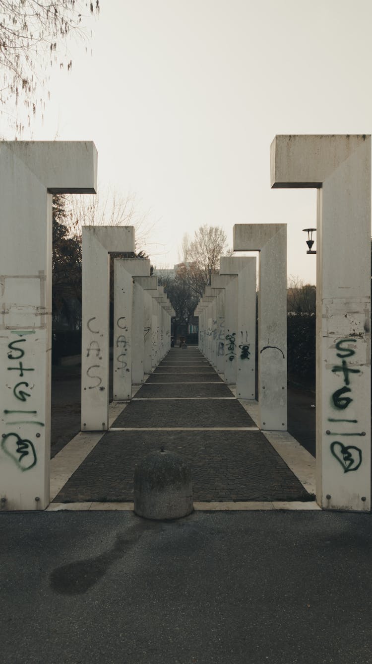 A Walkway With Series Of Concrete Posts And Beams