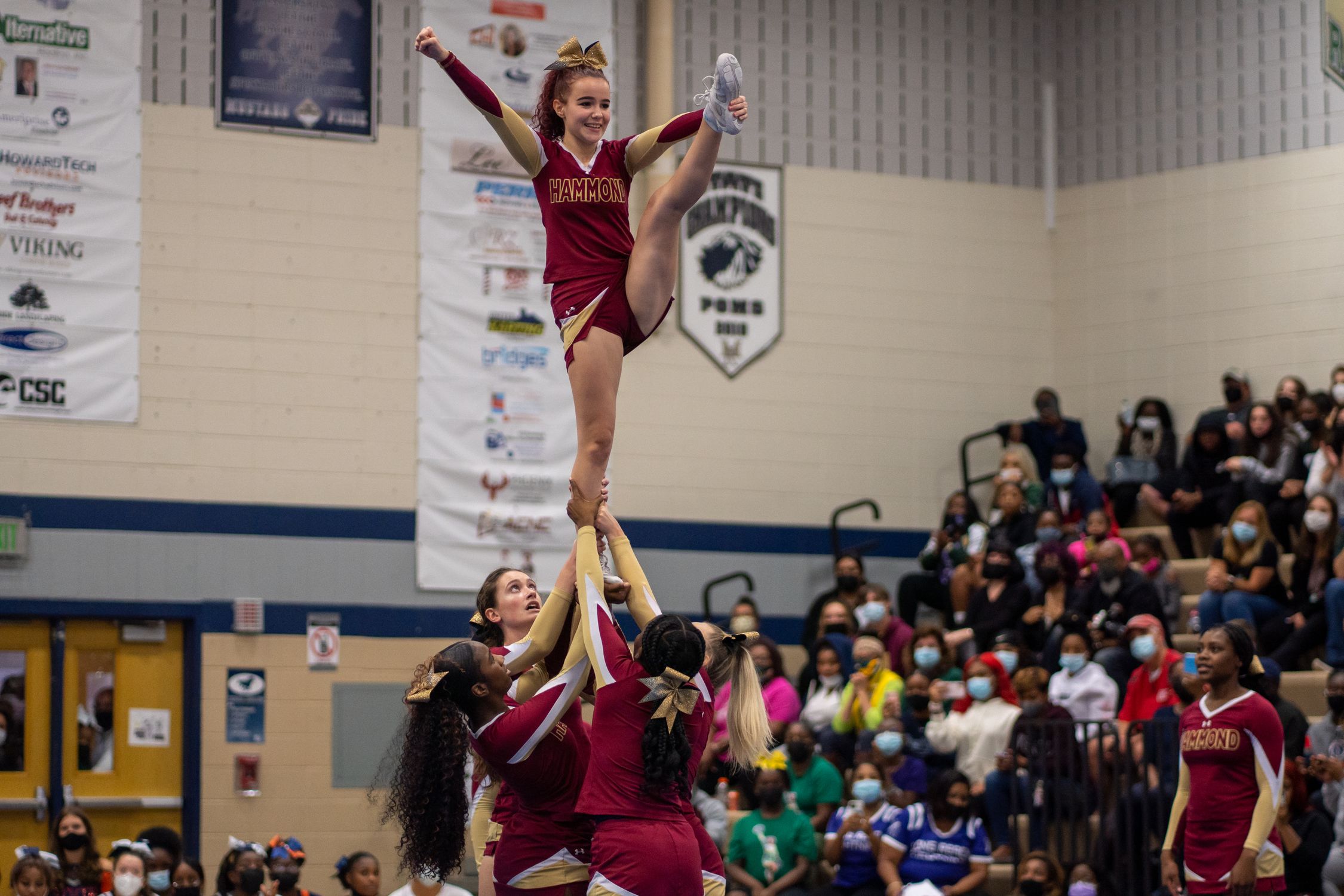 Cheer Unleashed Squad of Cheerleaders Doing a Stunt · Free Stock Photo
