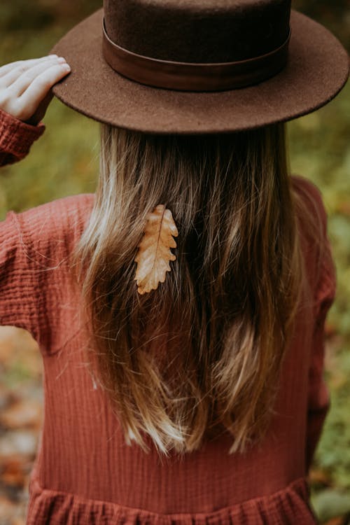 Brunette Girl Wearing Brown Hat