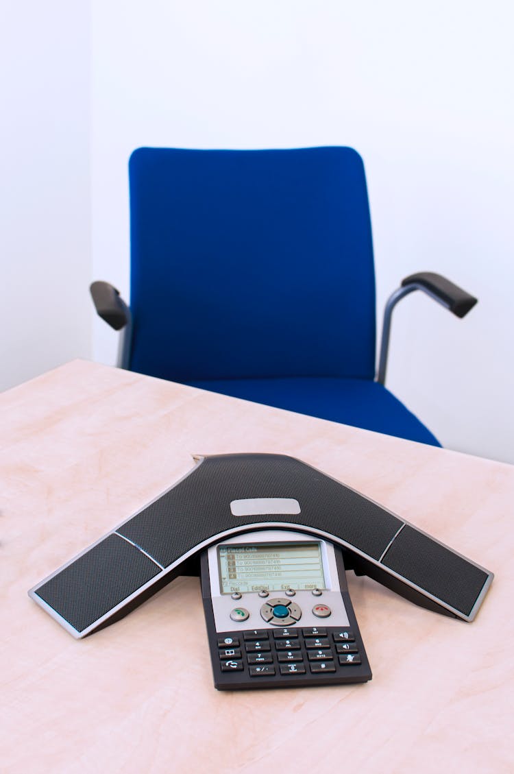 Modern Telephone On A Desk In Office 