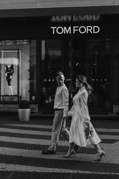 Free Couple of Newlywed Walking down City Street Stock Photo