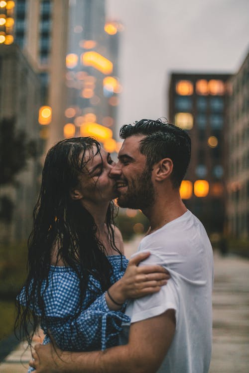 Couple Kissing in Rain
