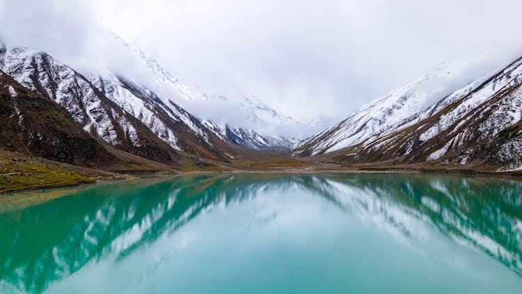 Mountains With Snow And Lake