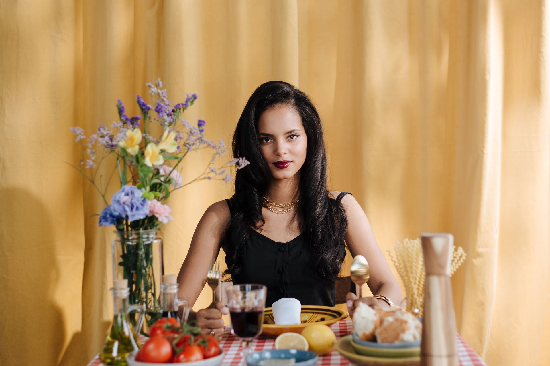 Woman by Table with Italian Food