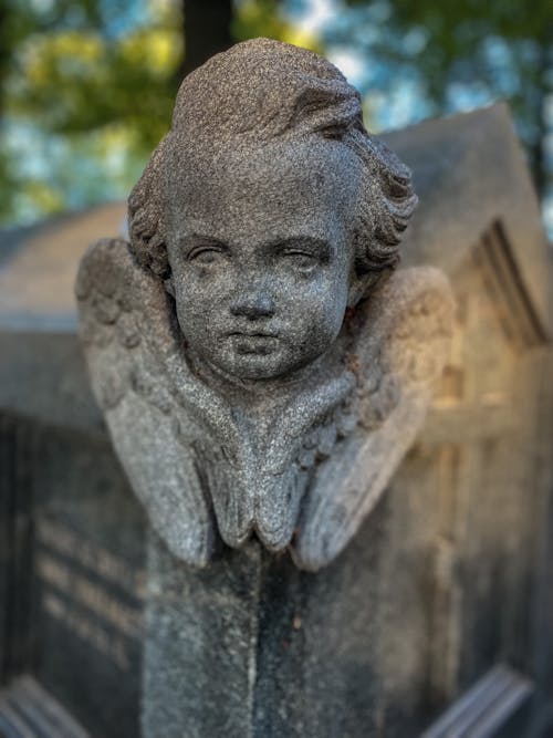 Free An Angel Sculpture in Close-Up Photography Stock Photo