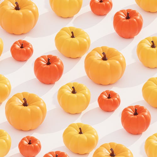 Pumpkins on White Surface