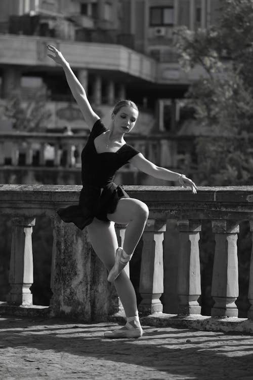 A Woman Doing Ballet on the Street