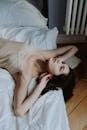 A Beautiful Woman Lying in Bed