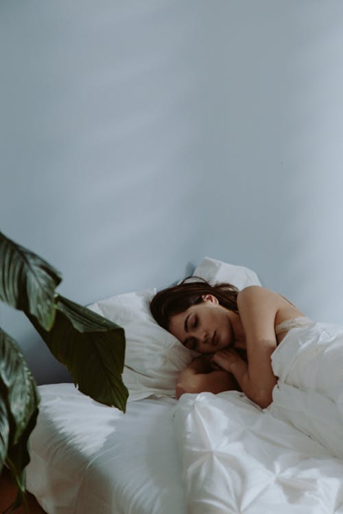 Beautiful Woman Sleeping on Bed