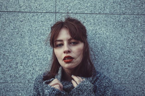 Woman in Gray Sweater