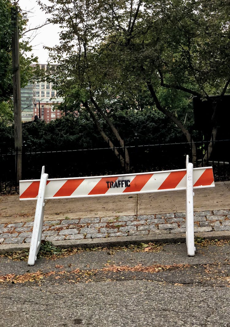 Red And White Barricade The Side Of The Street