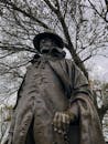 Man in Black Hoodie Jacket Statue