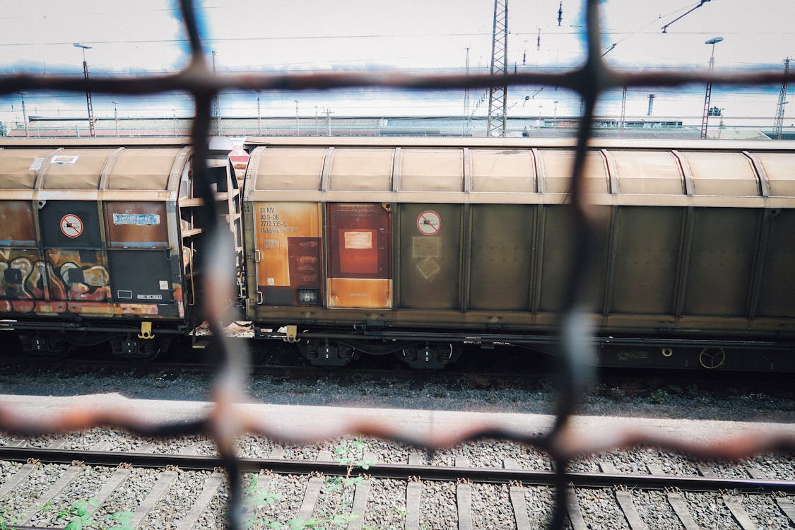 Free Photo of Train From the Fence Stock Photo