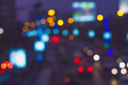 Free Blurred night view of a vibrant cityscape in Kolkata, India with colorful bokeh lights. Stock Photo